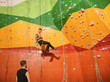 © Africa Studio - Young men in climbing gym