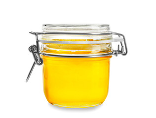 Wall Mural - Jar with aromatic honey on white background