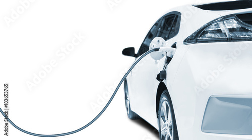Fotografía Charging an electric car in residential garage, Future of transportation