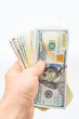© Dmitriy - Stack of dollar bills in hand