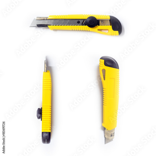 Fotografie, Obraz Yellow office paper cutter scalpel multiple views