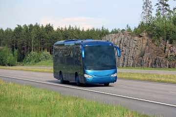 Wall Mural - blue coach bus on summer freeway