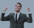 © ASDF - Portrait of successful business man winner celebrating