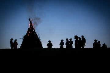 Wall Mural - Bonfire with people silhouettes