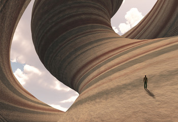 man on carved canyon rock with cloudy sky