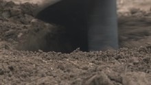 Extreme Close Up Of An Auger Digging 