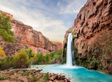 Fototapeta  - Beautiful Blue Waterfall coming out of canyon