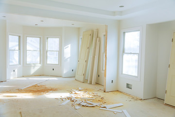 construction of the wooden frame of a roofFiberglass insulation installed