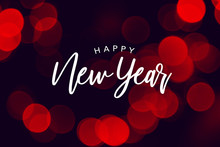 Happy New Year Celebration Text Over Red Duotone Bokeh Lights Background