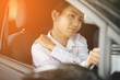 © sirikorn - Stressed of asian woman driver sitting inside her car