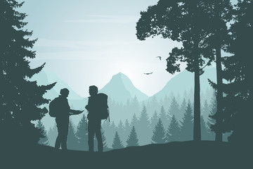 Wall Mural - two tourists walking through a mountain landscape with a forest looking for a path in the map under 