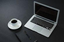 Black Coffee, Pen, Organizer And Laptop On Black Background
