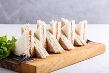 English Tea Sandwiches Platter On Wooden Board