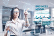 © photon_photo - The concept of business, technology, the Internet and the network. A young entrepreneur working on a virtual screen of the future and sees the inscription: Business model