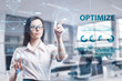© photon_photo - The concept of business, technology, the Internet and the network. A young entrepreneur working on a virtual screen of the future and sees the inscription: Optimize