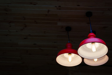 Round stylish lampshade on dark background