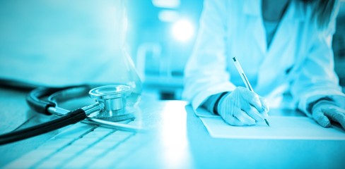 Poster - composite image of close-up of keyboard with stethoscope
