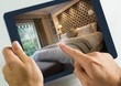 Hand touching tablet with accomodation hotel bedroom