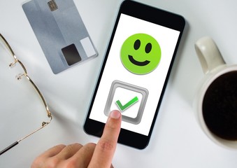 Poster - Hand touching correct tick and smiley face on phone