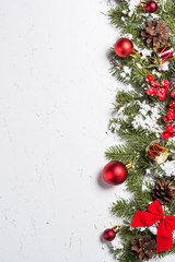 red christmas decorations on white. christmas background top view.