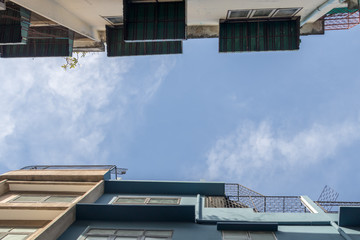 old building look up  blue sky background