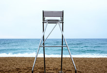 Lifeguard Chair On An Empty Beach.