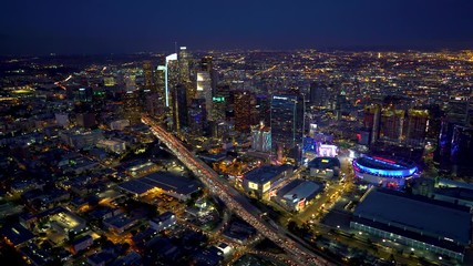 Wall Mural - Aerial view of a Downtown Los Angeles just after sunset in 4k