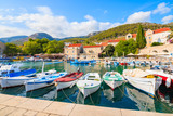 Fototapeta  - Typical colorful fishing boats in Bol port on Brac island, Dalmatia, Croatia