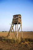Fototapeta Krajobraz - Hunter lookout tower in the middle of field