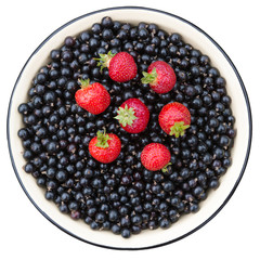 Poster - Strawberries and currant black. Bowl with black currant berry and strawberry isolated on white.