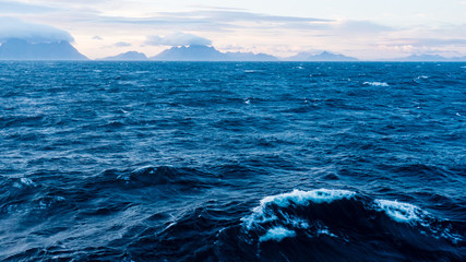lofoten, norway. the beautiful dramatic waves sea view and cloudy sky in lofoten.