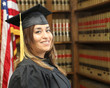 Successful young woman, portrait of a Hispanic college graduate.