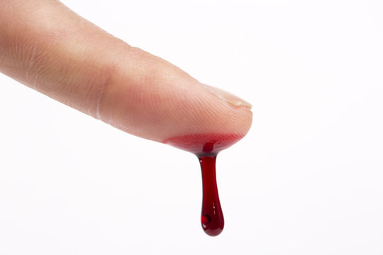 Fototapete - Blood dripping from man's finger, close-up