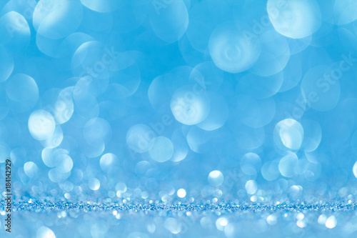 Cuadros en Lienzo Abstract blue glitter sparkle background