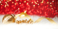 Christmas Gold Ball On Red Glitter Background