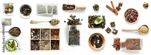 Cuadros en Lienzo Various kinds of tea, spoons and rustic dishware, brewed green tea, cinnamon