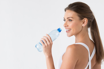 Wall Mural - Woman with bottle of water