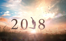 Happy New Year Concept: Alone Woman And Text For 2018 Over Sunrise Background.