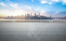Panoramic Skyline And Buildings With Empty Concrete Square Floor