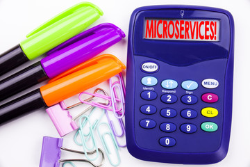 Leinwandbilder - Writing word Microservices text in the office with surroundings such as marker, pen writing on calculator. Business concept for Micro Services white background with copy space