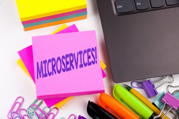 Leinwandbilder - Writing text showing Microservices made in the office with surroundings such as laptop, marker, pen. Business concept for Micro Services Workshop white background copy space