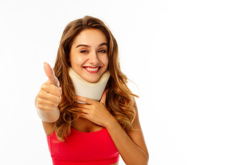 Young beautiful woman wearing medical collar over white background