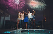 © oneinchpunch - Group of friends having fun on the rooftop of a beautiful penthouse