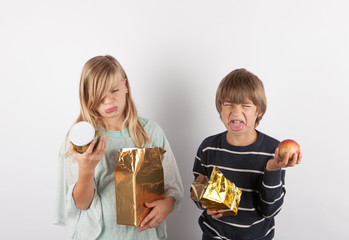 Wall Mural - Children shocked by bad gifts.