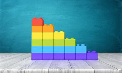 Fototapete - 3d rendering of a toy building blocks arranged into rainbow colored stars on top of a wooden desk.