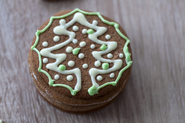 Christmas homemade gingerbread cookies on a wooden table