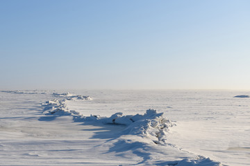 Wall Mural - ice toros on the ice of the lake in clear weather