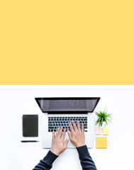 male using computer laptop on white desk table background.business technology,communication and netw