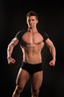 © be free - Man sportsman show muscular body on dark background
