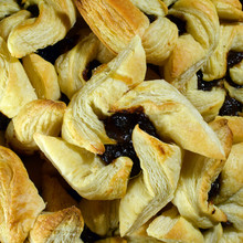 Joulutorttu (Christmas Tart) Is A Traditional Finnish Christmas Pastry.  Made From Puff Pastry In The Shape Of A Star Or Pinwheel And Filled With Prune Jam. Square Shape Top View Image.